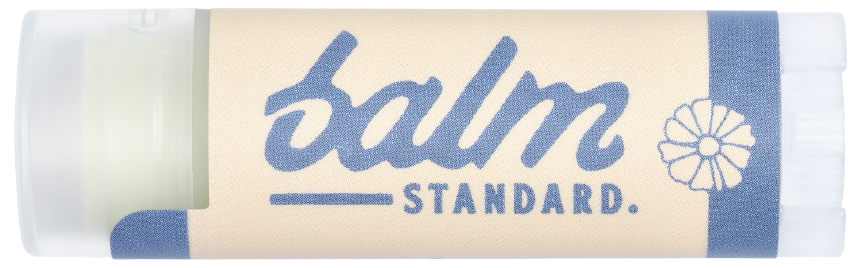 Lip balm with 'balm STANDARD.' text on a white background